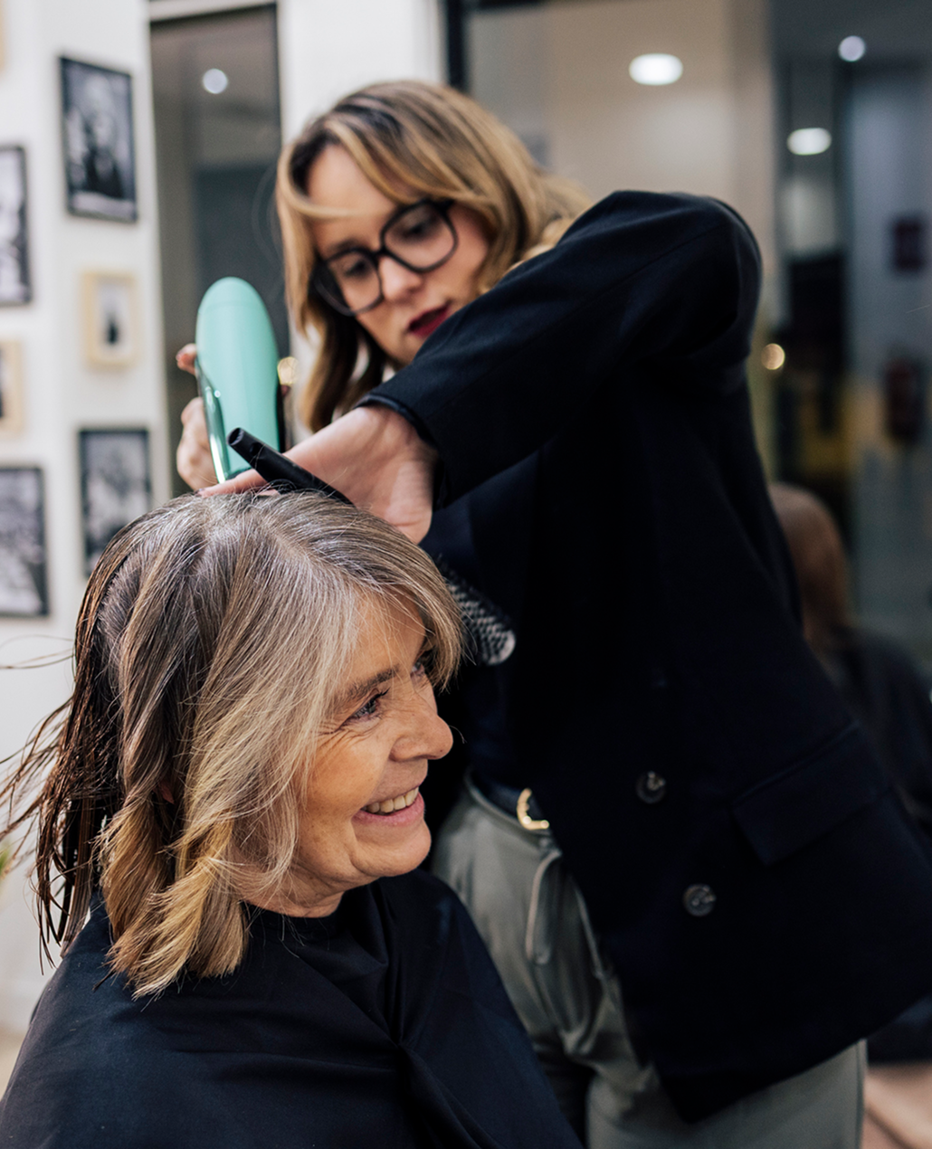 Hair care, brush and hairdresser with senior customer for hair maintenance,